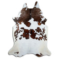 Tricolour cowhide rug of about 230 × 180 cm, seen from above: the exact hide you receive