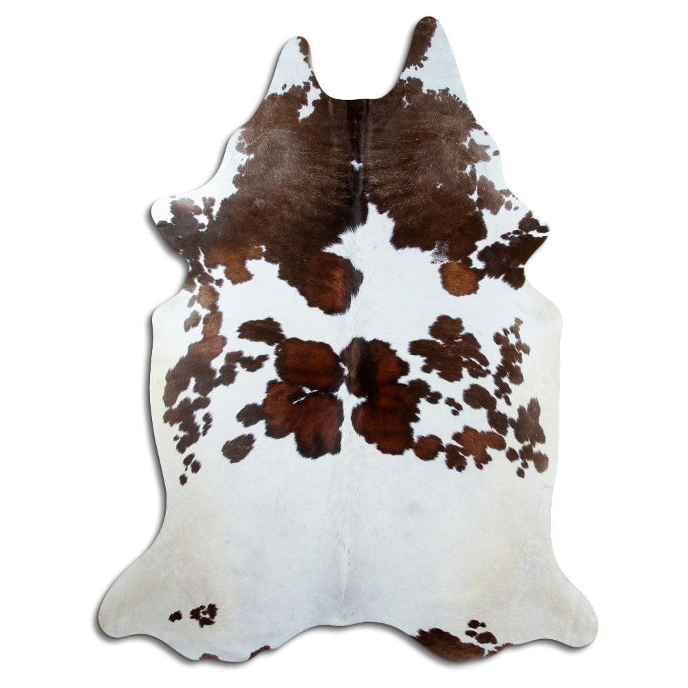 Tricolour cowhide rug of about 230 × 180 cm, seen from above: the exact hide you receive