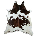 Tricolour cowhide rug of about 230 × 200 cm, seen from above: the exact hide you receive