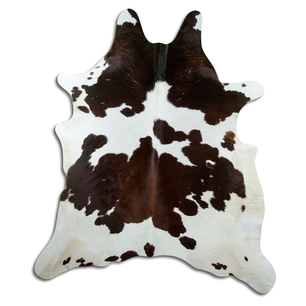 Tricolour cowhide rug of about 230 × 200 cm, seen from above: the exact hide you receive