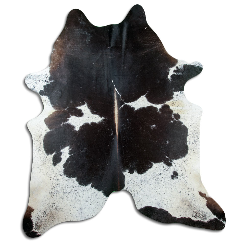 Tricolour cowhide rug of about 240 × 220 cm, seen from above: the exact hide you receive
