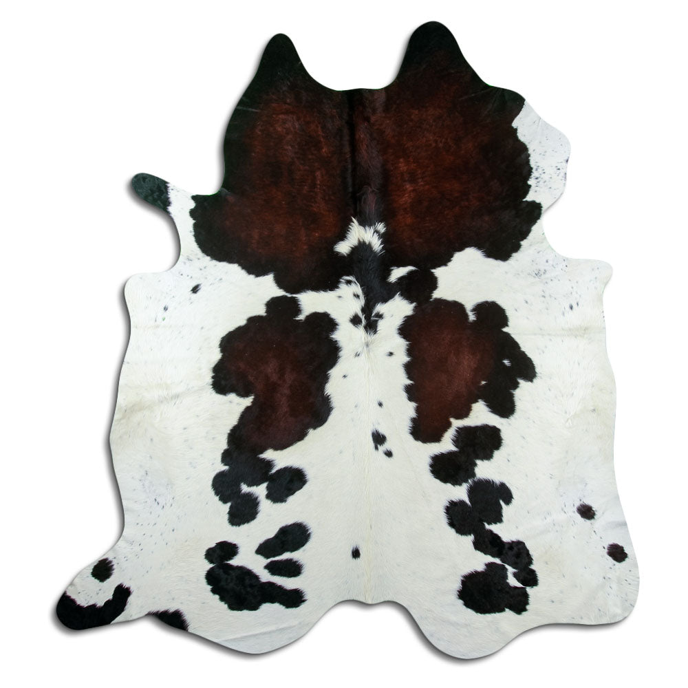 Tricolour cowhide rug of about 230 × 210 cm, seen from above: the exact hide you receive