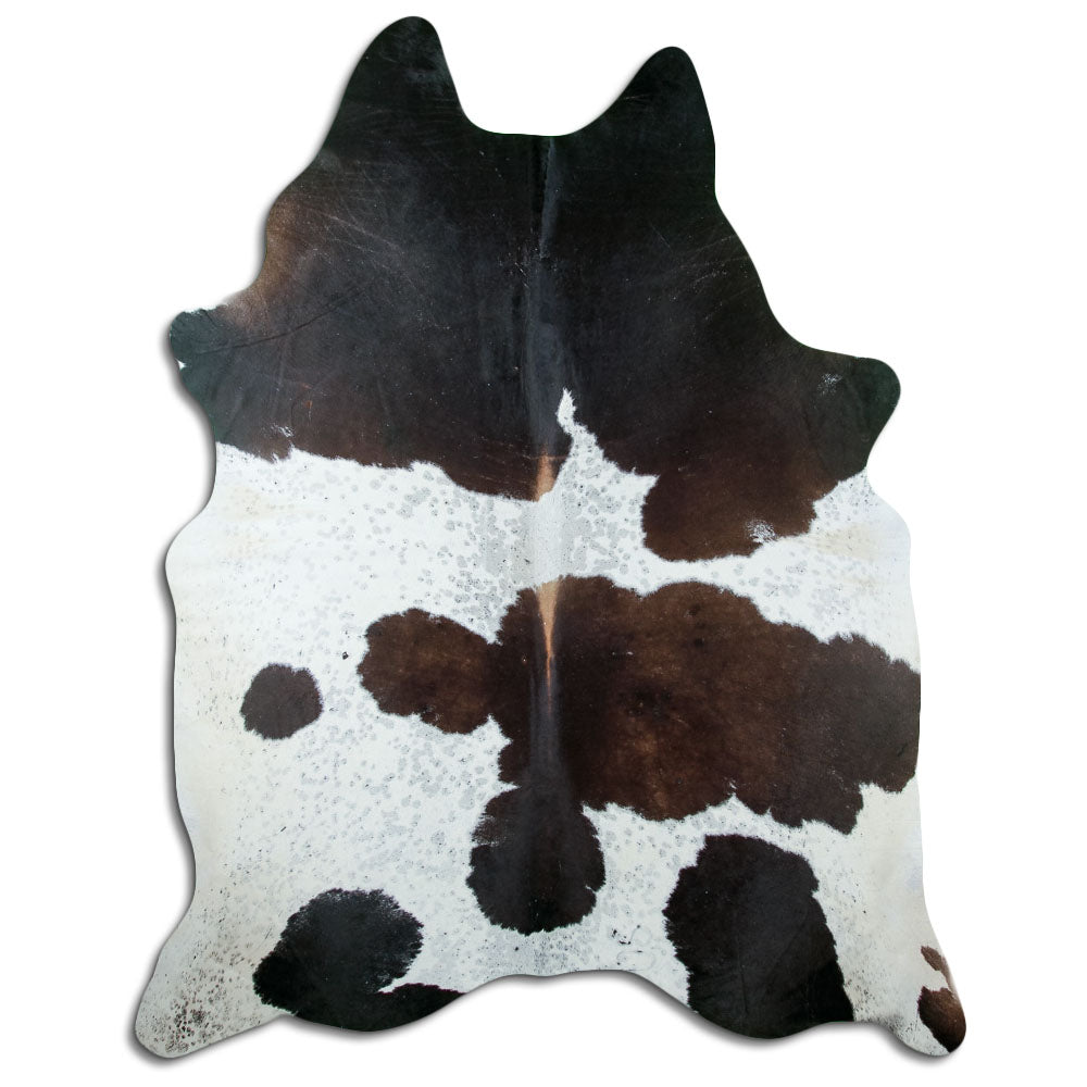 Tricolour cowhide rug of about 230 × 190 cm, seen from above: the exact hide you receive