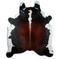 Tricolour cowhide rug of about 240 × 200 cm, seen from above: the exact hide you receive