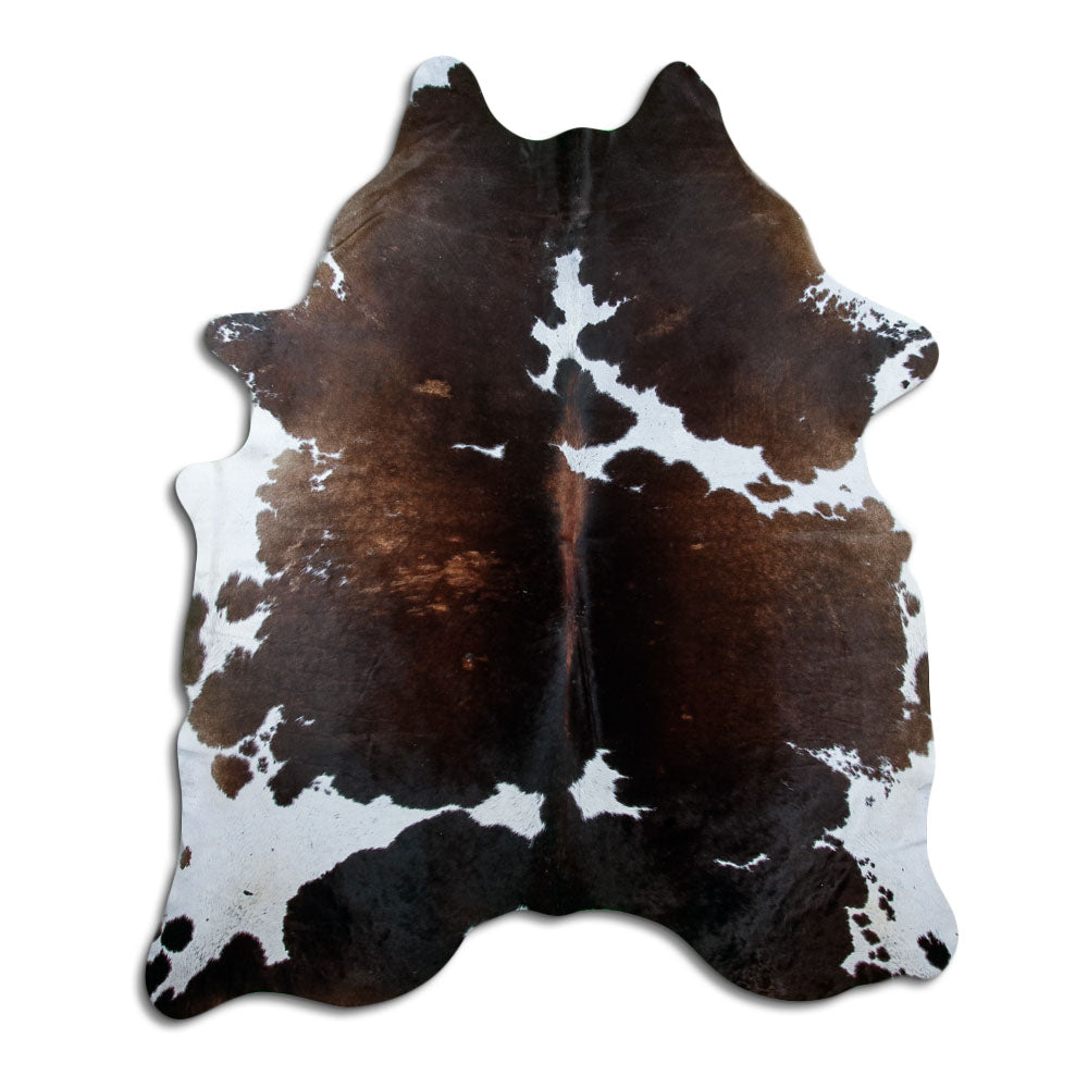 Tricolour cowhide rug of about 240 × 200 cm, seen from above: the exact hide you receive
