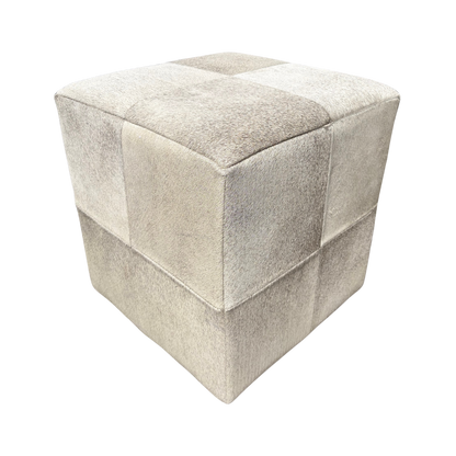 Patchwork cowhide ottoman in light grey tones