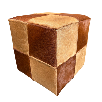 Patchwork cowhide ottoman in two shades of brown