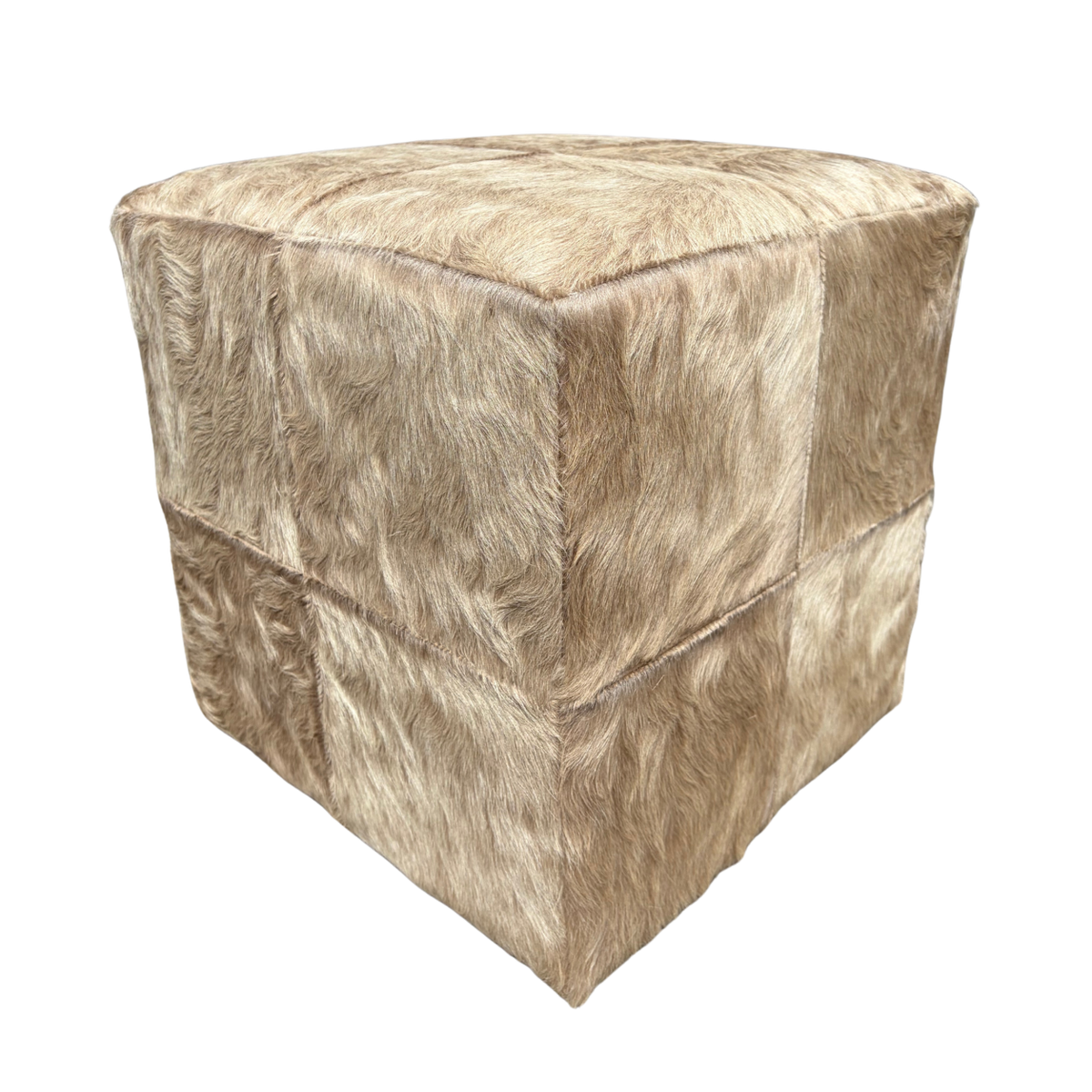 Patchwork cowhide ottoman in light natural tones