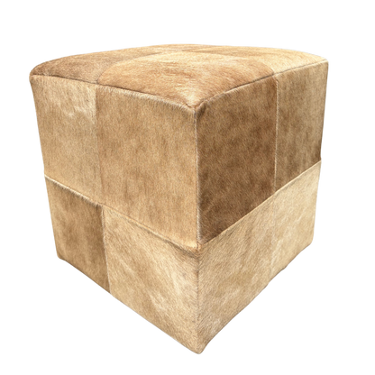 Patchwork cowhide ottoman in light brown tones