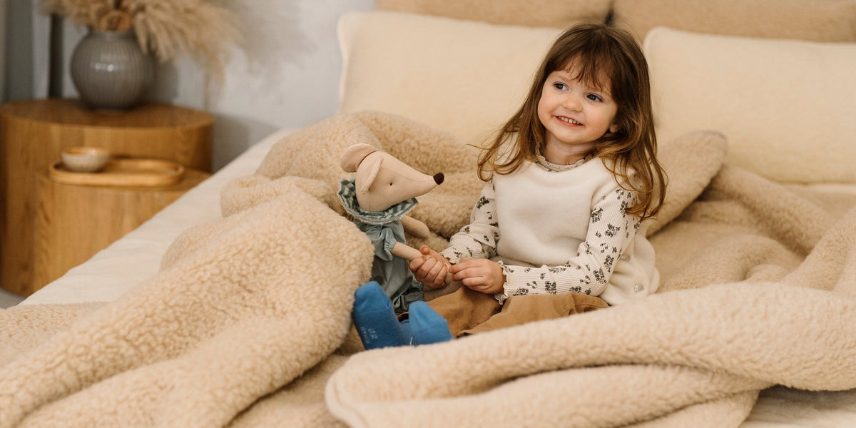 Merino wool blanket on a bed
