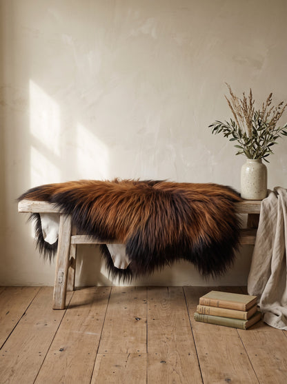 Icelandic Rusty sheepskin on a wooden bench