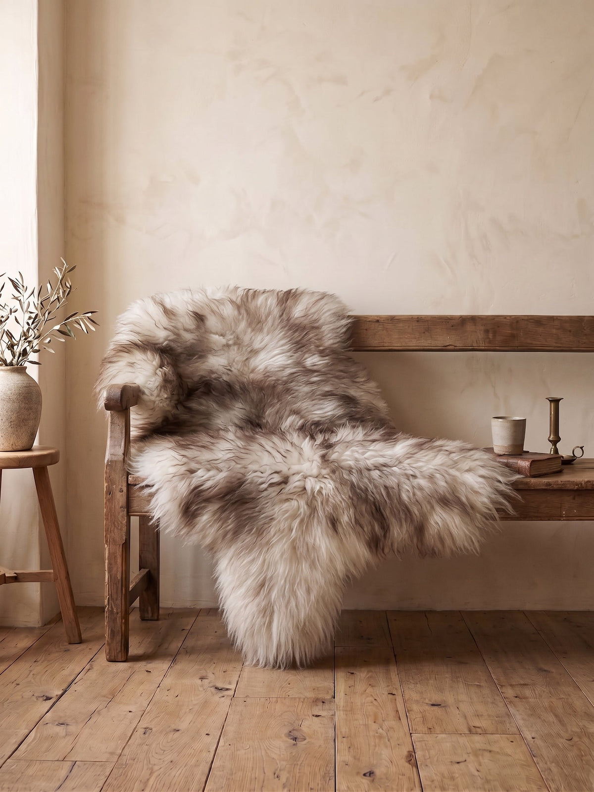 Icelandic mouflon sheepskin on a bench in a light room