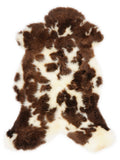 British multicolour sheepskin rug of about 105 × 60 cm, seen from above: the exact sheepskin you receive