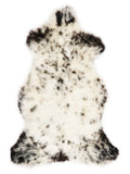 British multicolour sheepskin rug of about 110 × 55 cm, seen from above: the exact sheepskin you receive