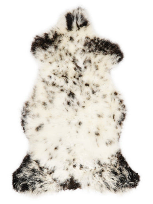 British multicolour sheepskin rug of about 110 × 55 cm, seen from above: the exact sheepskin you receive