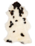 British multicolour sheepskin rug of about 130 × 70 cm, seen from above: the exact sheepskin you receive