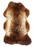 British multicolour sheepskin rug of about 110 × 60 cm, seen from above: the exact sheepskin you receive