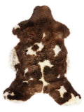British multicolour sheepskin rug of about 115 × 65 cm, seen from above: the exact sheepskin you receive