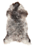British multicolour sheepskin rug of about 130 × 60 cm, seen from above: the exact sheepskin you receive