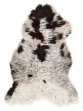 British multicolour sheepskin rug of about 120 × 70 cm, seen from above: the exact sheepskin you receive