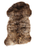 British multicolour sheepskin rug of about 110 × 60 cm, seen from above: the exact sheepskin you receive