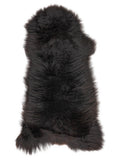 British multicolour sheepskin rug of about 120 × 50 cm, seen from above: the exact sheepskin you receive