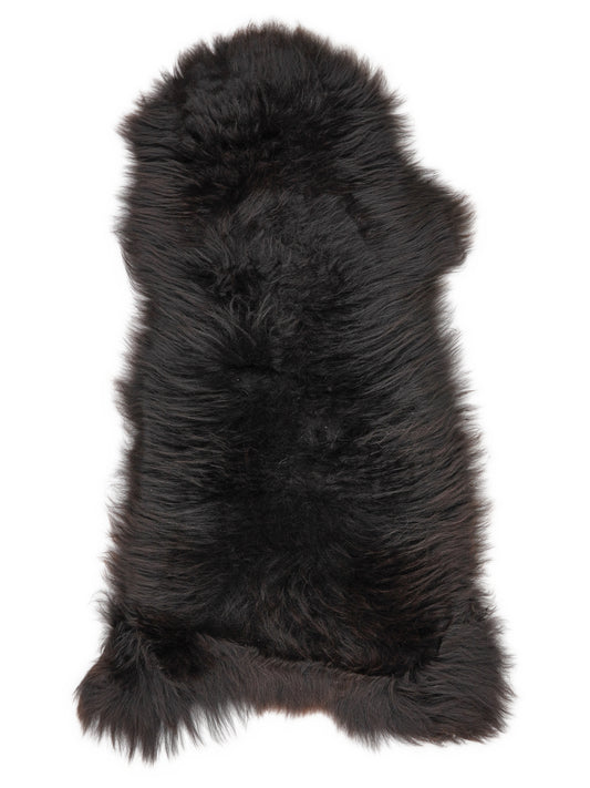 British multicolour sheepskin rug of about 120 × 50 cm, seen from above: the exact sheepskin you receive
