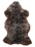 British multicolour sheepskin rug of about 110 × 60 cm, seen from above: the exact sheepskin you receive