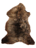 British multicolour sheepskin rug of about 105 × 60 cm, seen from above: the exact sheepskin you receive