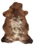 British multicolour sheepskin rug of about 110 × 65 cm, seen from above: the exact sheepskin you receive