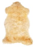 British multicolour sheepskin rug of about 130 × 70 cm, seen from above: the exact sheepskin you receive
