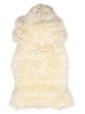 British multicolour sheepskin rug of about 130 × 70 cm, seen from above: the exact sheepskin you receive