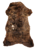 Brown sheepskin rug of about 120 × 60 cm, seen from above: the exact sheepskin you receive