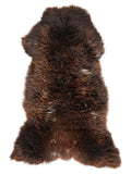 Brown sheepskin rug of about 130 × 65 cm, seen from above: the exact sheepskin you receive