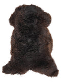 Brown sheepskin rug of about 130 × 65 cm, seen from above: the exact sheepskin you receive