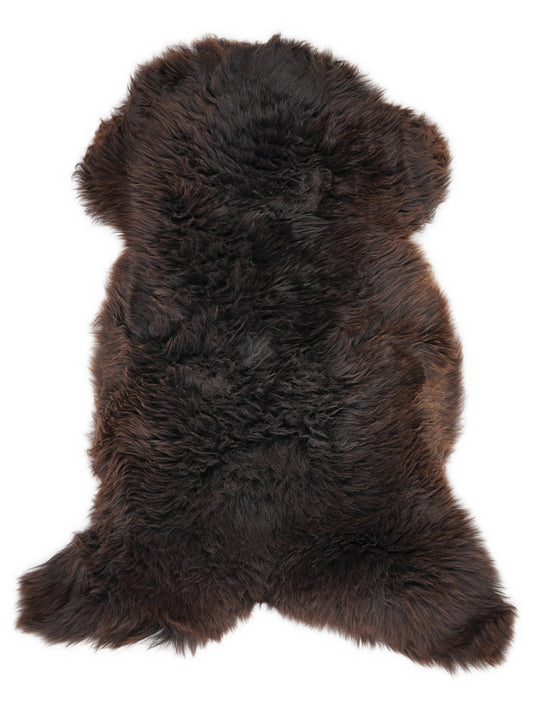 Brown sheepskin rug of about 130 × 65 cm, seen from above: the exact sheepskin you receive