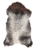 British multicolour sheepskin rug of about 130 × 70 cm, seen from above: the exact sheepskin you receive