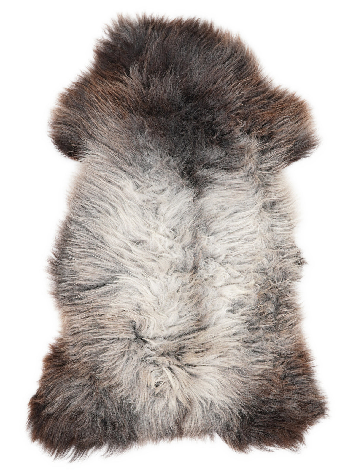 British multicolour sheepskin rug of about 120 × 65 cm, seen from above: the exact sheepskin you receive