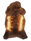 British multicolour sheepskin rug of about 120 × 60 cm, seen from above: the exact sheepskin you receive