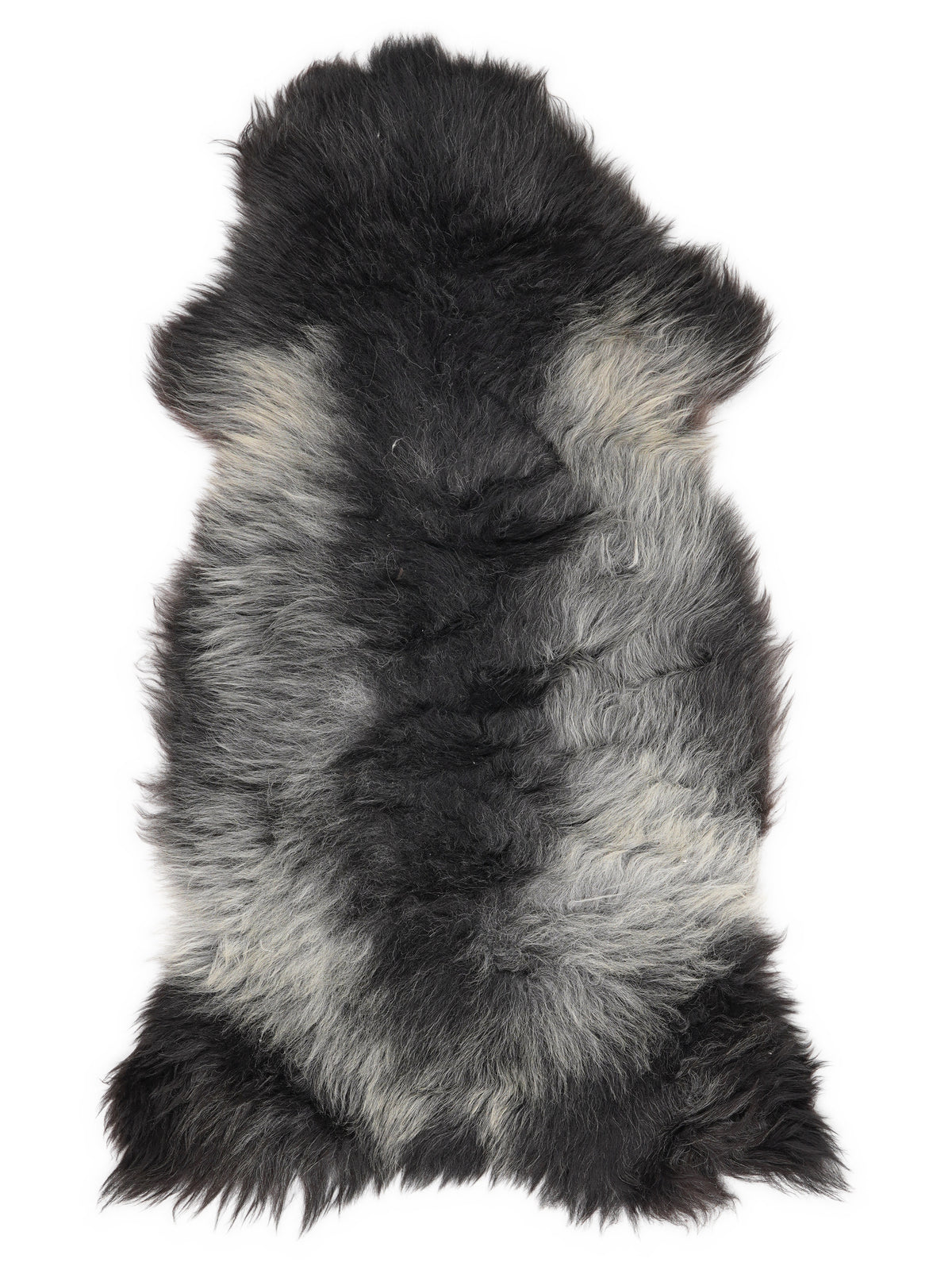 British multicolour sheepskin rug of about 120 × 60 cm, seen from above: the exact sheepskin you receive