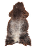 British multicolour sheepskin rug of about 130 × 60 cm, seen from above: the exact sheepskin you receive