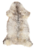 British multicolour sheepskin rug of about 125 × 60 cm, seen from above: the exact sheepskin you receive
