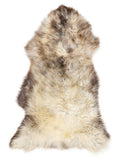 British multicolour sheepskin rug of about 125 × 65 cm, seen from above: the exact sheepskin you receive