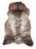 British multicolour sheepskin rug of about 125 × 70 cm, seen from above: the exact sheepskin you receive