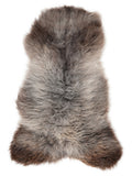 British multicolour sheepskin rug of about 120 × 60 cm, seen from above: the exact sheepskin you receive