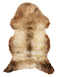 British multicolour sheepskin rug of about 120 × 65 cm, seen from above: the exact sheepskin you receive