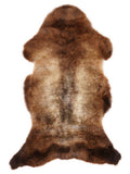 British multicolour sheepskin rug of about 115 × 60 cm, seen from above: the exact sheepskin you receive