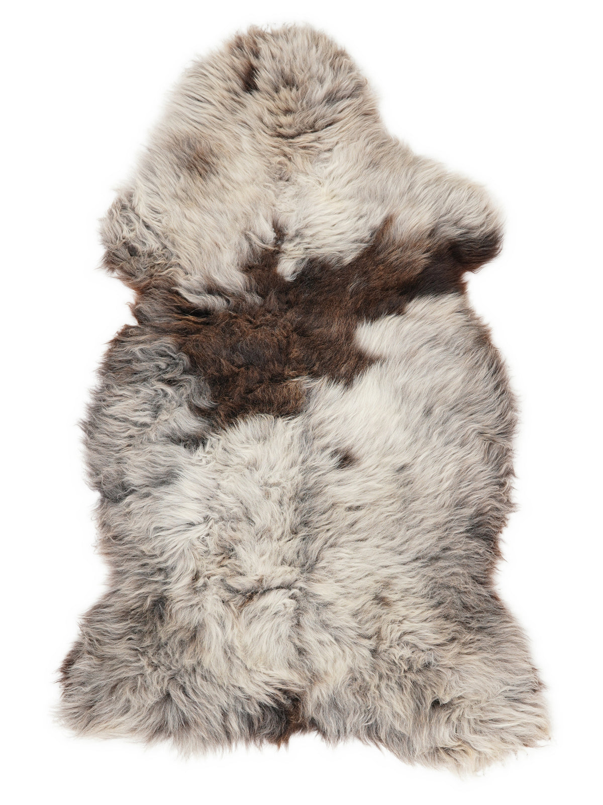 British multicolour sheepskin rug of about 135 × 70 cm, seen from above: the exact sheepskin you receive