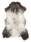 British multicolour sheepskin rug of about 120 × 65 cm, seen from above: the exact sheepskin you receive