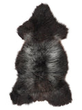 British multicolour sheepskin rug of about 125 × 60 cm, seen from above: the exact sheepskin you receive